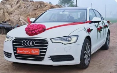 White Audi A4 decorated for a wedding